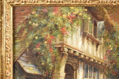 Lot 1199 - Frank Moss Bennett (1874-1952) a pair, oil on board - figures and timbered cottages, both signed and dated 1917, 35cm x 24.5cm, in ornate gilt frames (2)
