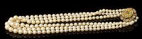 Lot 435 - Cultured pearl triple-strand necklace with...