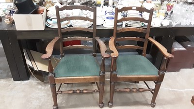 Lot 1069 - Set of six oak ladderback chairs with green drop in seats on turned front legs joined by turned stretcher