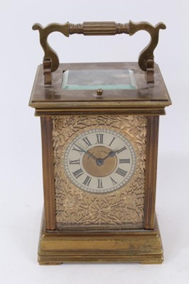 Lot 653 - Late 19th century French brass carriage clock with pierced front plate, repeat mechanism