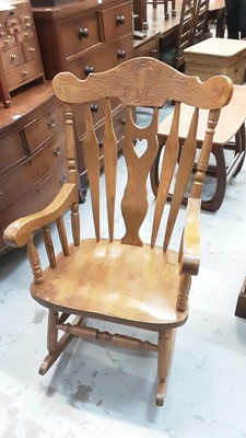 Lot 1077 - Beech rocking elbow chair