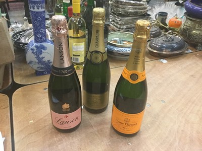 Lot 456 - Champagne- one 750ml bottle of Lanson Le Rose champagne, one 750ml bottle of Veuve Clicquot champagne and a 750ml bottle of Andre Carpenter champagne (3)