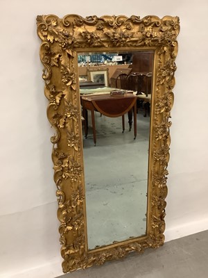 Lot 1456 - Good quality late 19th century carved giltwood framed wall mirror with bevelled plate 145 cm x 72 cm