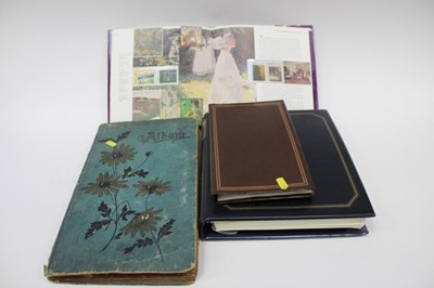 Lot 1415 - Edwardian postcard album containing mostly greetings postcards, album saucy postcards, Westminster Stamps Stars of Stage and Screen