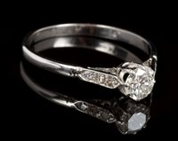 Lot 448 - Diamond single stone ring with a Transitional...