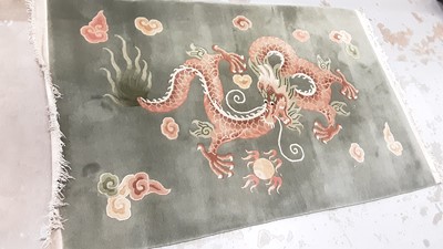 Lot 1114 - Chinese dragon rug and coffee table