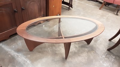 Lot 1085 - G-Plan teak Astro table of oval form with inset glass top, 122cm x 66cm