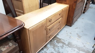 Lot 1065 - Good quality Blonde Ercol Windsor 455 sideboard with three central drawers flanked by cupboards, 154.5cm wide, 43cm deep, 68cm high