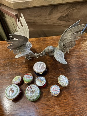 Lot 167 - Collection of enamel boxes and pair of plated table models of fighting cocks