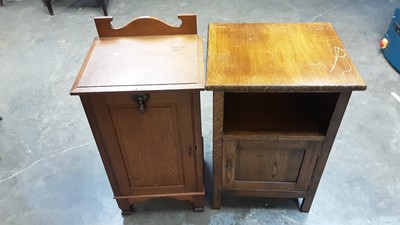 Lot 1107 - Edwardian oak pot cupboard, together with a later oak bedside cupboard (2)