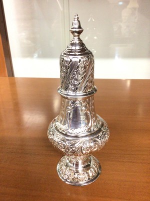 Lot 839 - Victorian silver sugar castor with embossed scroll decoration (London 1891)