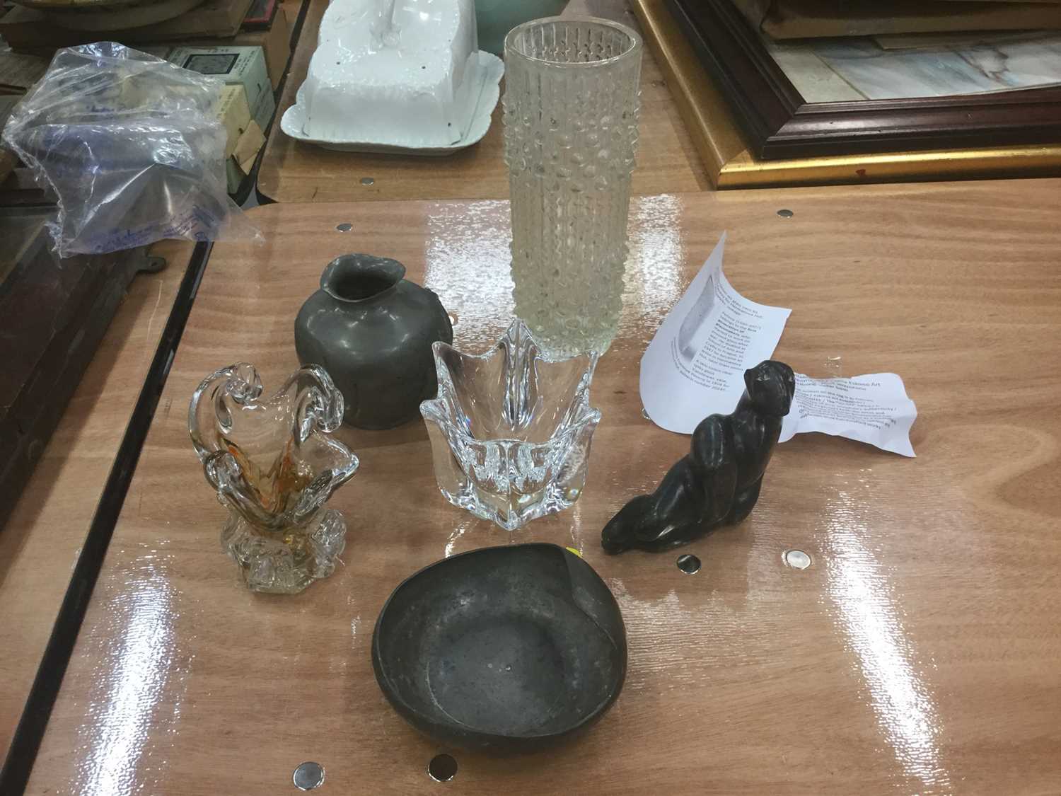 Lot 87 - Canadian Inuit carving together with Orrefors vase and other glassware and pewter.