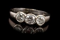 Lot 454 - Diamond three stone ring with three brilliant...