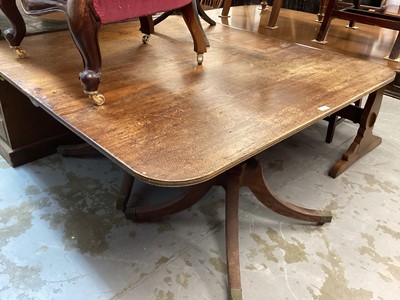 Lot 1097 - Pair George IV mahogany D end dining table pedestals on splayed legs and brass cap castors 129 cm wide