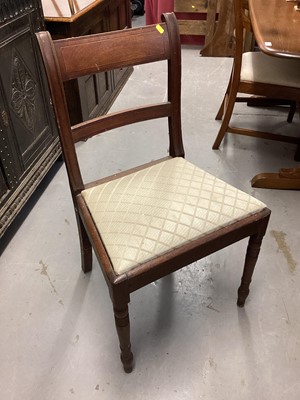 Lot 1104 - Set seven early 19th century mahogany bar back dining chairs on turned and sabre legs comprising six standards and elbow chair (7)