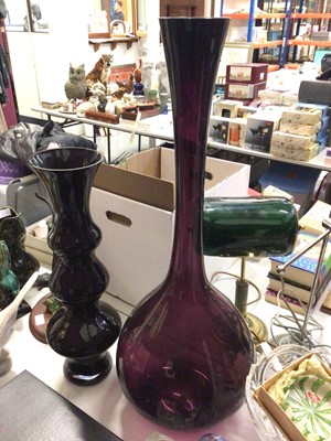 Lot 264 - Group of coloured glassware including various paperweights, Wedgwood duck, Caithness vase, large amethyst glass bottle vase, set of four Edinburgh Crystal wine glasses in box, other cut glass ware...