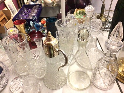 Lot 264 - Group of coloured glassware including various paperweights, Wedgwood duck, Caithness vase, large amethyst glass bottle vase, set of four Edinburgh Crystal wine glasses in box, other cut glass ware...