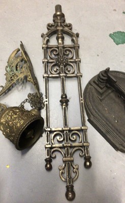 Lot 280 - Cast iron boot scraper, cast metal architectural mount and a brass wall mounted bell