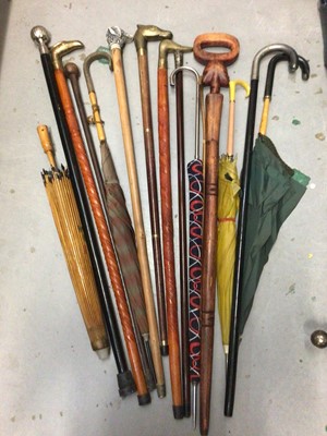 Lot 281 - Collection of various walking sticks, umbrellas, canes, including one with silver knop