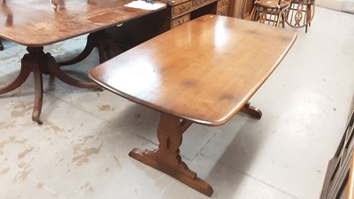 Lot 1119 - Ercol dining table on end standards joined by stretcher, 152cm x 84cm x 72cm high, together with four dining chairs