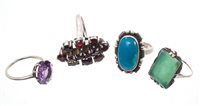 Lot 463 - Four dress rings - to include faux alexandrite...