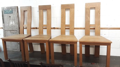 Lot 1124 - Set of four light oak high back dining chairs