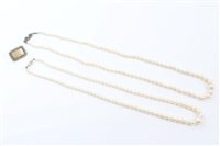 Lot 464 - Two cultured pearl necklaces, each with a...