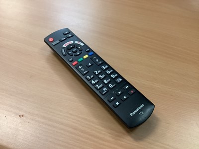 Lot 2 - 43" Panasonic Smart TV with remote control. Please not that it has a slight damage to the top of TV, please see images.