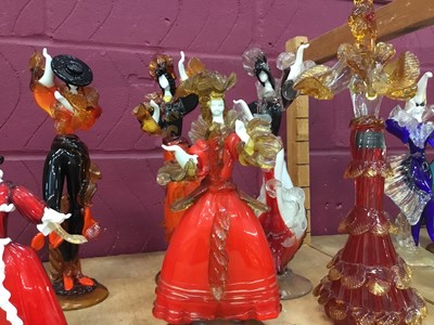 Lot 632 - Eleven Murano red glass figures 25-43 cm high