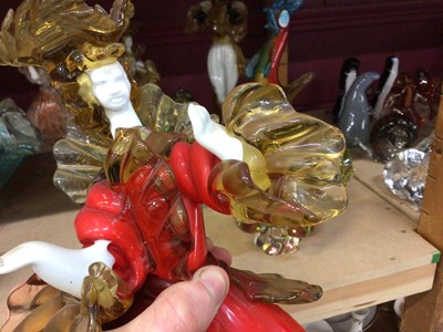 Lot 632 - Eleven Murano red glass figures 25-43 cm high