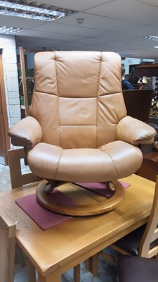 Lot 1150 - Contemporary reclining swivel chair and pair of matching footstools