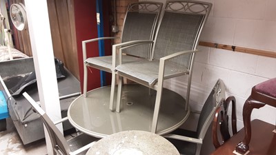 Lot 1152 - Contemporary patio set comprising circular table and four elbow chairs