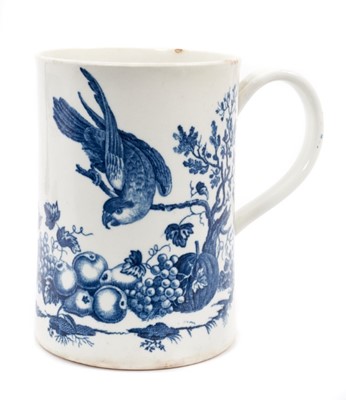 Lot 85 - A Worcester blue printed Parrot Pecking Fruit pattern mug, circa 1770