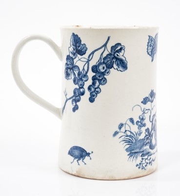 Lot 85 - A Worcester blue printed Parrot Pecking Fruit pattern mug, circa 1770