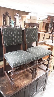 Lot 1157 - Pair of antique oak dining chairs with upholstered seats and backs on turned and block legs joined by turned stretchers