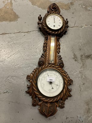 Lot 594 - Victorian carved walnut banjo barometer