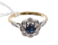 Lot 478 - Sapphire and diamond cluster ring, the...