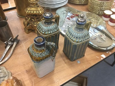 Lot 517 - Trio of Royal Doulton Whisky and Brandy flagons