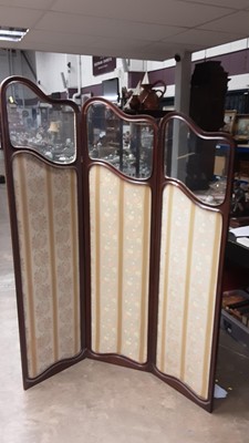 Lot 1175 - Early 20th century mahogany framed three fold dressing screen with glazed and fabric panels