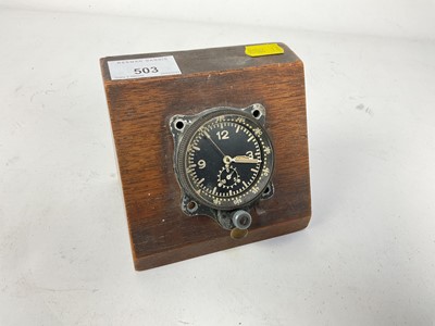 Lot 503 - Second World War aircraft cockpit clock mounted on wooden base