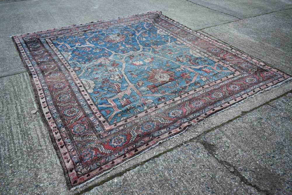 Lot 1509 - Old Persian carpet retailed by Maple & Co. London