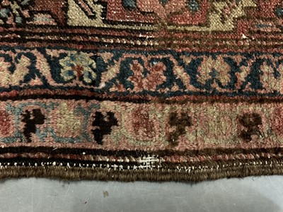 Lot 1509 - Old Persian carpet retailed by Maple & Co. London