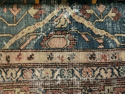 Lot 1509 - Old Persian carpet retailed by Maple & Co. London