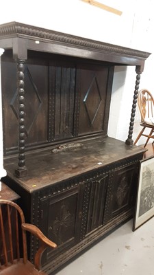 Lot 1193 - Late Victorian carved oak two height sideboard with panelled back flanked by bobbin turned supports, two carved panelled doors below, 152cm wide, 61cm deep, 188cm high