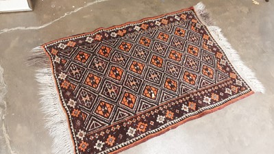 Lot 1195 - Eastern rug with geometric decoration on orange and brown ground, 116cm x 82cm