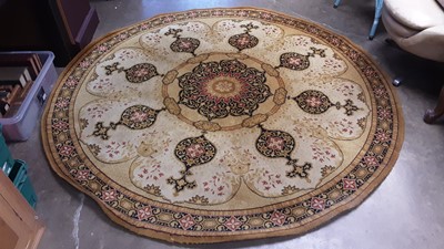 Lot 1199 - Concerto circular rug with central medallion on beige ground, 198cm diameter