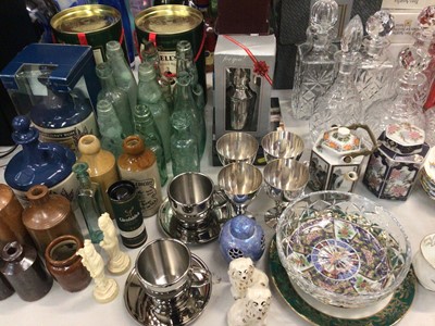 Lot 301 - Collection of glass and stoneware bottles, empty whisky and rum bottles, cut glass decanters, decorative ceramics, Beswick and Royal Doulton horses, boxed dolls and sundries