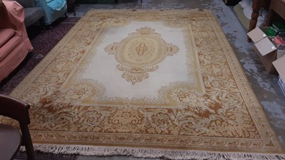 Lot 1200 - Super Keshan wool rug with foliate decoration on cream and beige ground, 350cm x 250cm