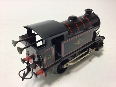 Lot 58 - Hornby O gauge 0-4-0 clockwork locomotives including Southern black A600, LNER green 460, BR black red lined 82011 and one other (4)