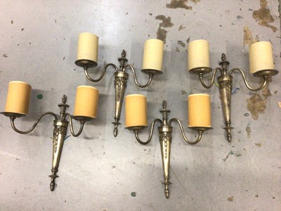 Lot 321 - Set of four metal two branch wall lights with shades